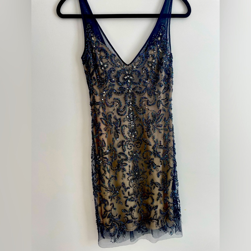 Embroidered beaded dress by Basix Black Label perfect for holidays or New Years
